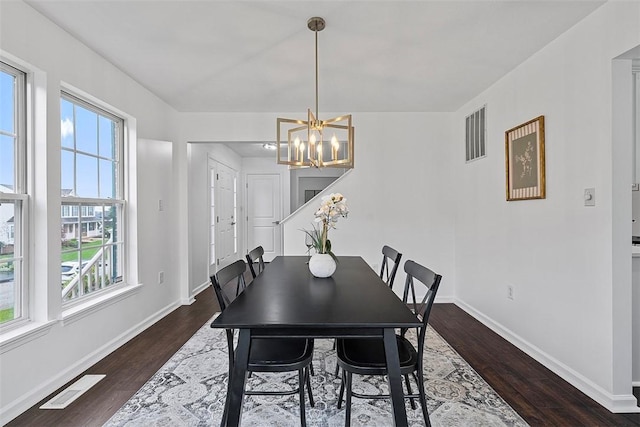 153 Birchwood Way, Irwin, PA 15642 - dining area featuring a chandelier, wood finished floors, and baseboards