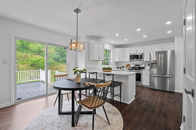 153 Birchwood Way, Irwin, PA 15642 - dining room with dark wood finished floors, recessed lighting, a chandelier, baseboards, and a textured ceiling