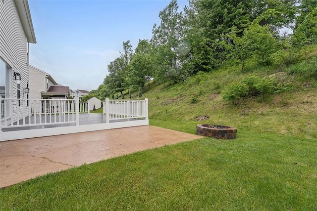 153 Birchwood Way, Irwin, PA 15642 - view of green lawn with an outdoor fire pit and a patio