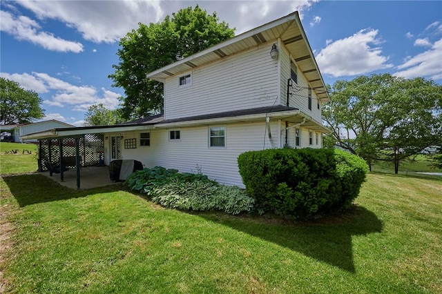 125 Srader Grove Rd, South Buffalo Twp, PA 16229 - back of property with a lawn and a patio area