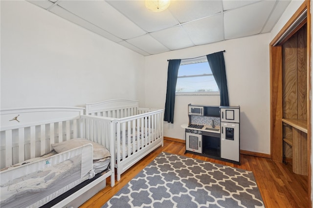 125 Srader Grove Rd, South Buffalo Twp, PA 16229 - bedroom with a paneled ceiling, wood finished floors, and baseboards