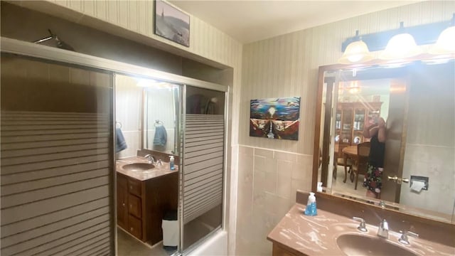 1303 Forest Ave, New Kensington, PA 15068 - bathroom featuring vanity and tile walls