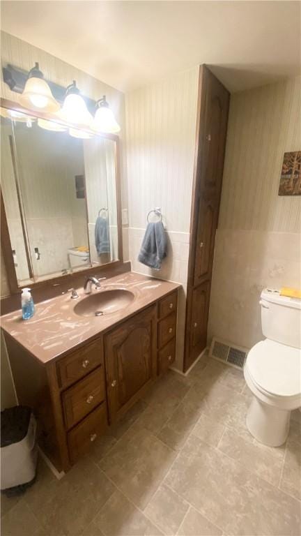 1303 Forest Ave, New Kensington, PA 15068 - bathroom featuring toilet and vanity