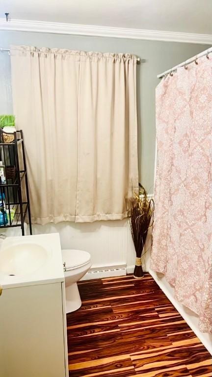 300 Beechwood Ave, Farrell, PA 16121 - full bathroom with vanity, toilet, wood finished floors, ornamental molding, and a baseboard heating unit