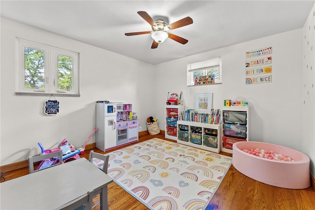 5101 Azalea Dr, Whitehall, PA 15236 - playroom with ceiling fan, wood finished floors, and baseboards