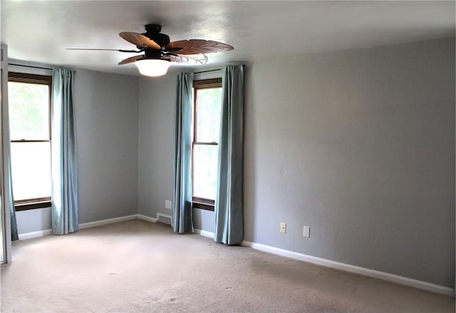 5827 Kings School Rd, Bethel Park, PA 15102 - spare room featuring healthy amount of natural light, baseboards, and light colored carpet