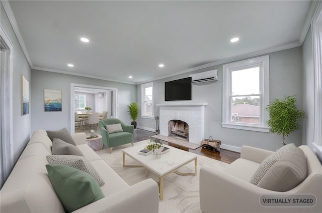 1204 Cambridge St, Natrona Hts/Harrison Twp, PA 15065 - living room with a wall mounted air conditioner, ornamental molding, recessed lighting, wood finished floors, and a fireplace