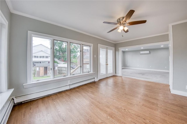 1204 Cambridge St, Natrona Hts/Harrison Twp, PA 15065 - unfurnished room with a baseboard heating unit, baseboard heating, a wall mounted AC, wood finished floors, and crown molding