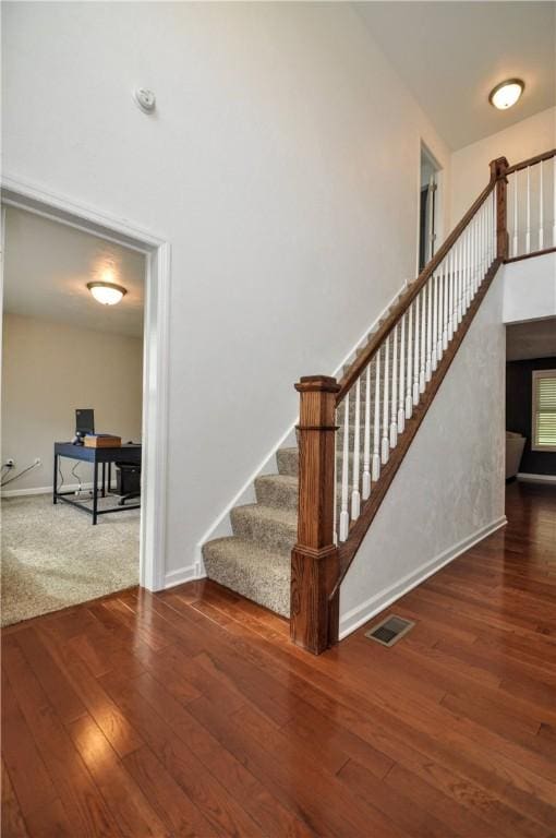 1624 Windsor Rd, North Huntingdon, PA 15642 - stairs featuring wood finished floors and baseboards