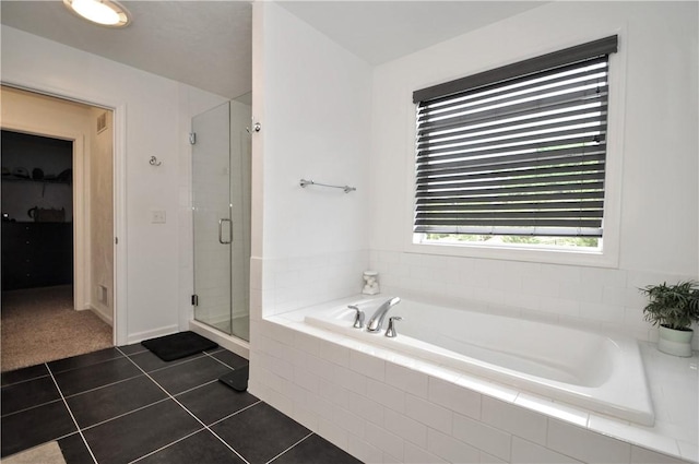 1624 Windsor Rd, North Huntingdon, PA 15642 - full bathroom with a stall shower, a garden tub, tile patterned floors, and a spacious closet