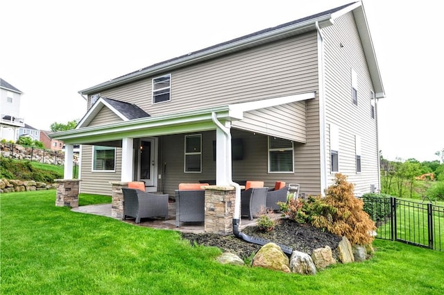 1624 Windsor Rd, North Huntingdon, PA 15642 - rear view of house with a patio area and an outdoor hangout area