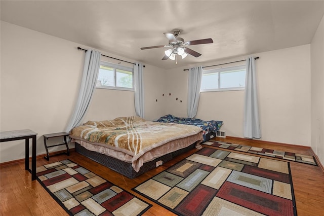 1105 Greentree Rd, Green Tree, PA 15220 - bedroom with wood finished floors, baseboards, and ceiling fan