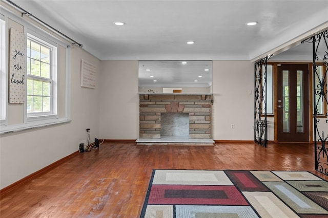 1105 Greentree Rd, Green Tree, PA 15220 - unfurnished living room featuring a fireplace, wood finished floors, baseboards, and recessed lighting