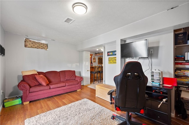 5121 Forest Ridge Dr, South Fayette, PA 15057 - home office featuring wood finished floors and a textured ceiling