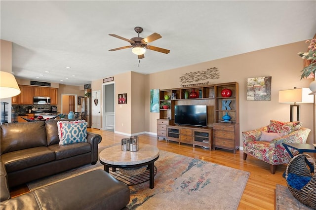5121 Forest Ridge Dr, South Fayette, PA 15057 - living room featuring light wood-type flooring, a ceiling fan, baseboards, and recessed lighting