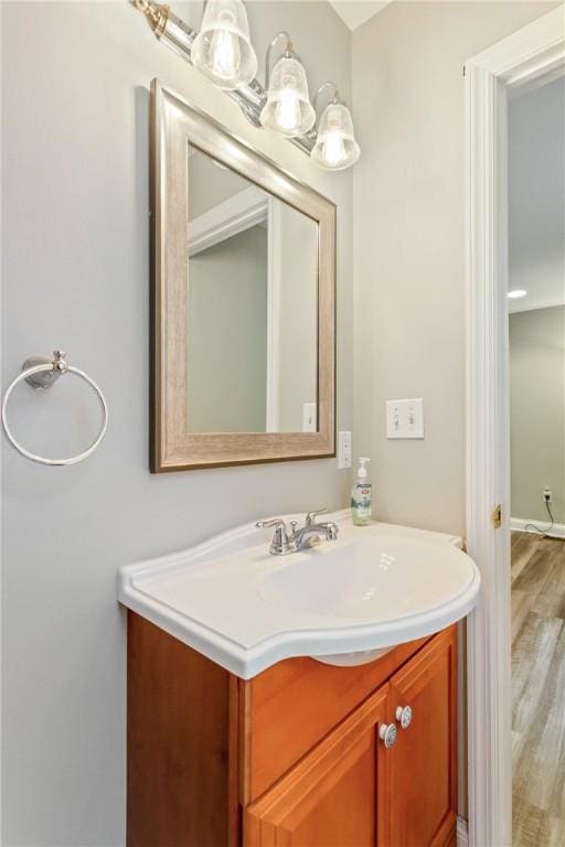 19 Telescope St, South Side, PA 15203 - bathroom featuring vanity and wood finished floors