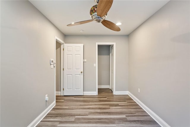19 Telescope St, South Side, PA 15203 - unfurnished bedroom featuring light wood-style floors, baseboards, and a ceiling fan