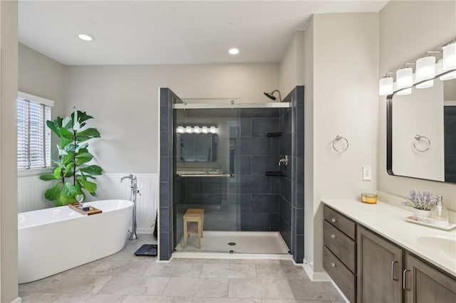 319 Buffalo Ridge Rd, Peters Twp, PA 15317 - full bathroom with a shower stall, vanity, a soaking tub, and recessed lighting