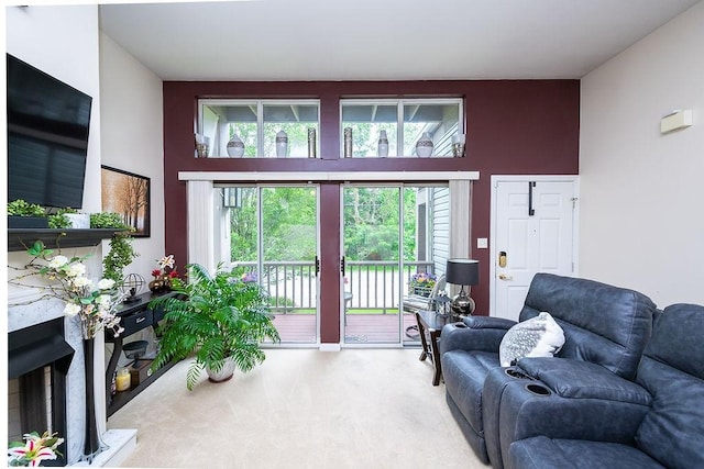 1099 Riverside Dr Unit H, Bridgewater, PA 15009 - living room featuring carpet floors and a high end fireplace