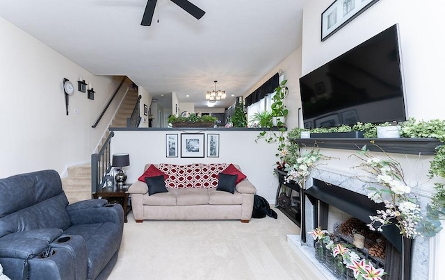 1099 Riverside Dr Unit H, Bridgewater, PA 15009 - living room with stairway, ceiling fan, a chandelier, and carpet floors