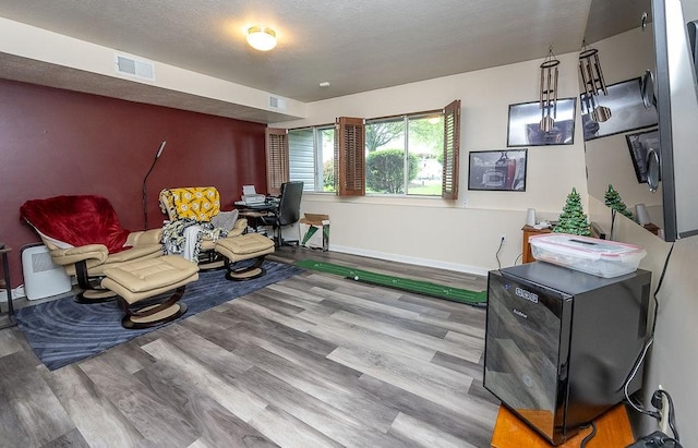 1099 Riverside Dr Unit H, Bridgewater, PA 15009 - living area featuring wood finished floors, baseboards, and an office area
