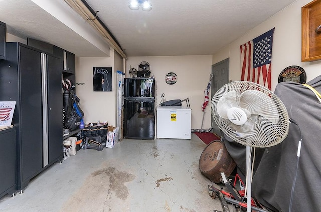 1099 Riverside Dr Unit H, Bridgewater, PA 15009 - garage featuring freestanding refrigerator and refrigerator