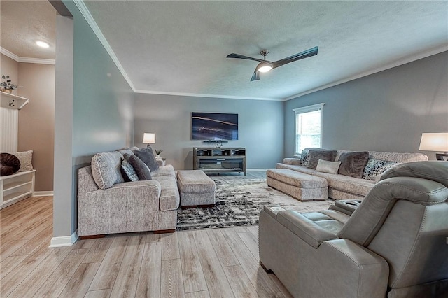 8 Pony Ct, Findlay Twp, PA 15126 - living area featuring light wood-style floors, ornamental molding, ceiling fan, a textured ceiling, and baseboards