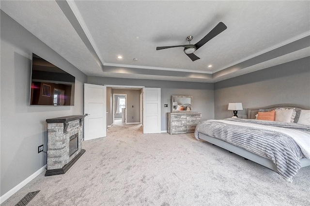 8 Pony Ct, Findlay Twp, PA 15126 - bedroom with a tray ceiling, baseboards, carpet floors, a fireplace, and crown molding
