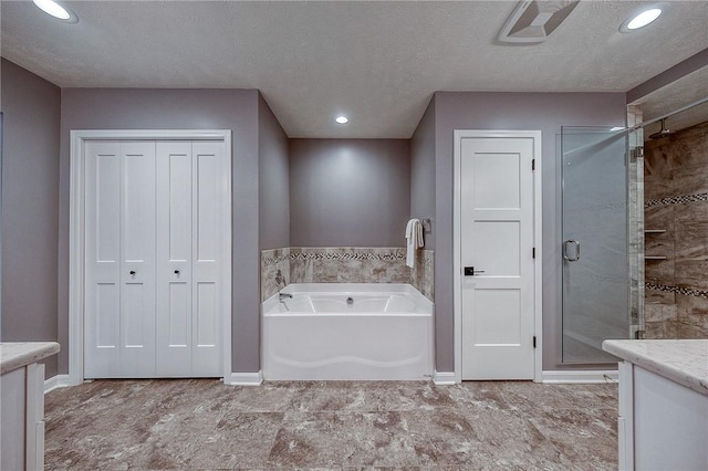 8 Pony Ct, Findlay Twp, PA 15126 - bathroom with a stall shower, vanity, a bath, a closet, and a textured ceiling