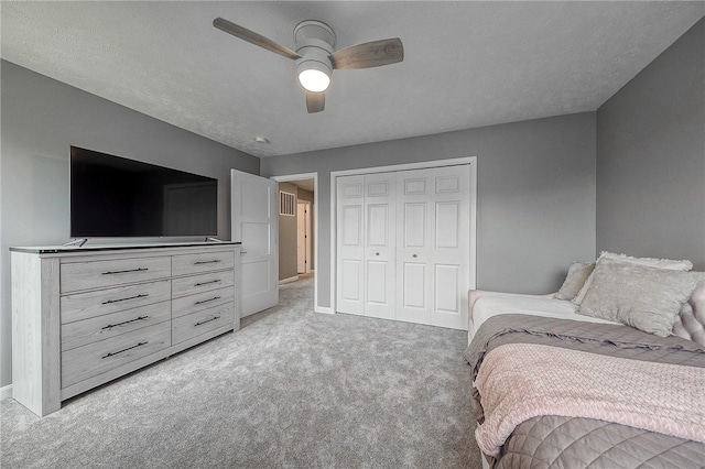 8 Pony Ct, Findlay Twp, PA 15126 - bedroom featuring light colored carpet, a closet, baseboards, and a ceiling fan
