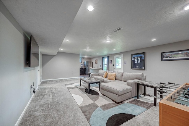 8 Pony Ct, Findlay Twp, PA 15126 - carpeted living room with recessed lighting and a textured ceiling