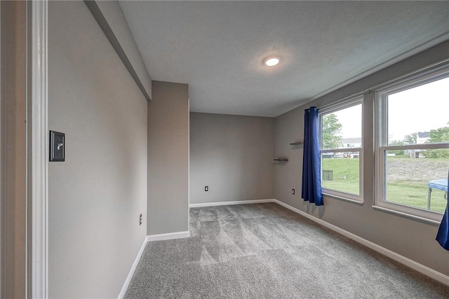 8 Pony Ct, Findlay Twp, PA 15126 - empty room with carpet flooring, baseboards, and a textured ceiling