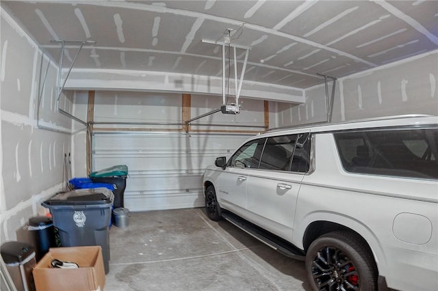 8 Pony Ct, Findlay Twp, PA 15126 - garage featuring a garage door opener