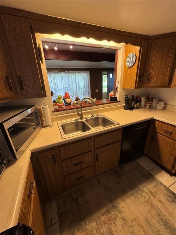 937 Freeport Rd, Natrona Hts/Harrison Twp, PA 15065 - kitchen with stainless steel microwave, a sink, dishwasher, and light countertops