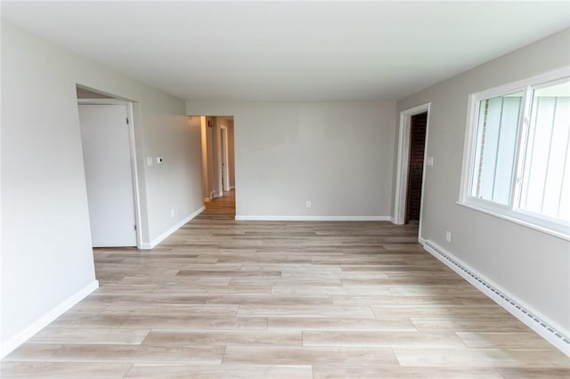 5 Albert St, South Union Twp, PA 15401 - spare room featuring baseboards and light wood-style floors