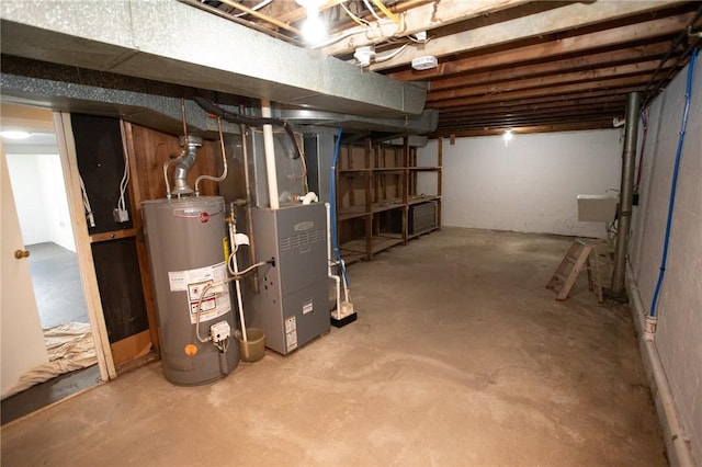 5 Albert St, South Union Twp, PA 15401 - unfinished basement featuring water heater and heating unit
