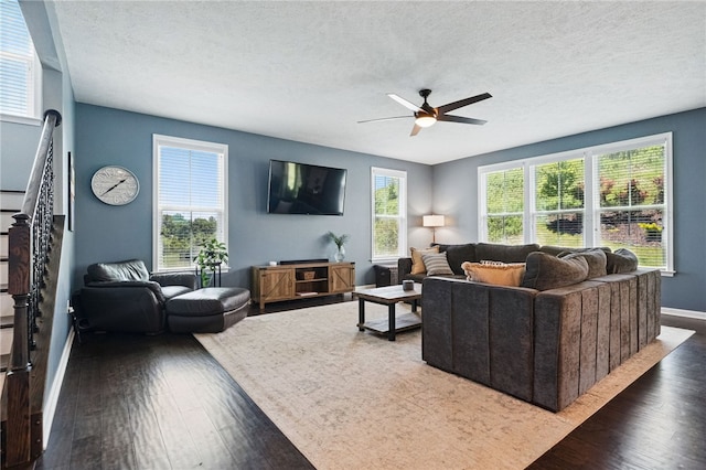 1340 Diamond Ct, Upper St Clair, PA 15241 - living room featuring hardwood / wood-style floors, baseboards, a ceiling fan, a textured ceiling, and stairs