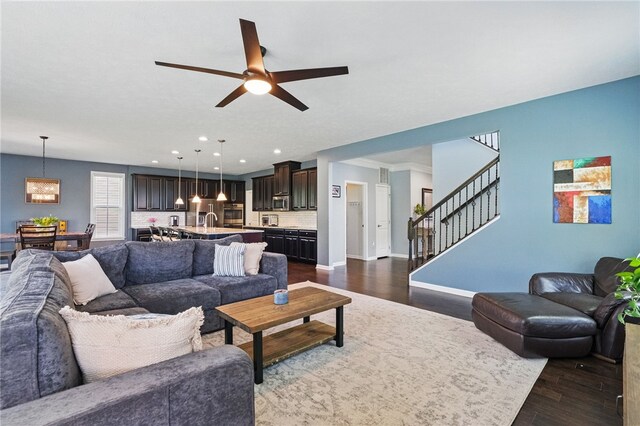 1340 Diamond Ct, Upper St Clair, PA 15241 - living area with dark wood-style floors, a ceiling fan, stairway, baseboards, and recessed lighting
