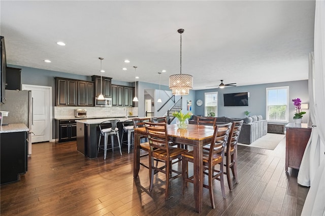 1340 Diamond Ct, Upper St Clair, PA 15241 - dining space with stairs, a ceiling fan, dark wood-style floors, and recessed lighting