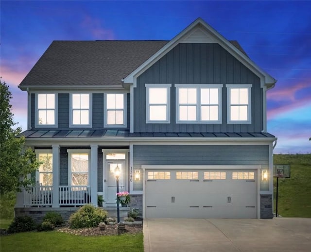 1340 Diamond Ct, Upper St Clair, PA 15241 - view of front of home with a porch, a standing seam roof, driveway, board and batten siding, and a garage