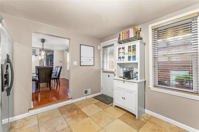 1816 Jane, South Side, PA 15203 - dining area featuring plenty of natural light, baseboards, and a chandelier