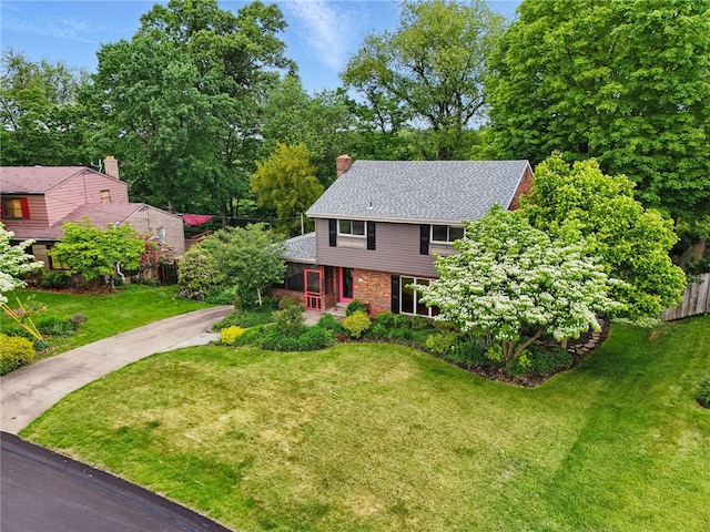 306 Tadmar Ave, Ross Twp, PA 15237 - view of front of property with brick siding, a chimney, driveway, and a shingled roof