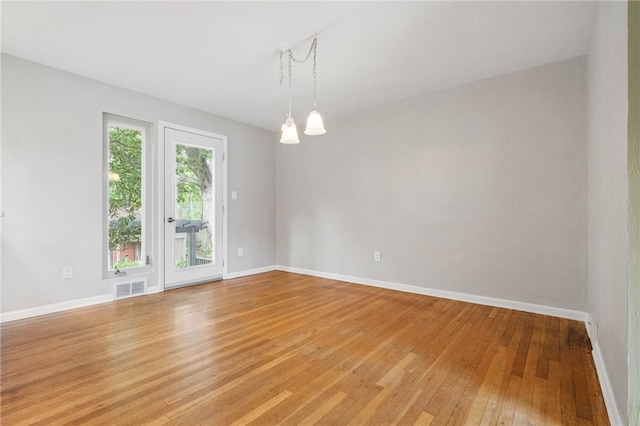306 Tadmar Ave, Ross Twp, PA 15237 - spare room with light wood-style floors and baseboards