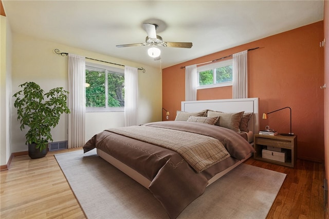 306 Tadmar Ave, Ross Twp, PA 15237 - bedroom featuring wood finished floors, ceiling fan, and baseboards