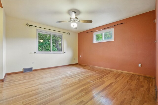 306 Tadmar Ave, Ross Twp, PA 15237 - empty room with light wood finished floors, ceiling fan, and baseboards