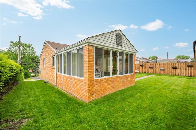 1137 Michael Dr, Baldwin Boro, PA 15227 - view of side of property with brick siding and a sunroom