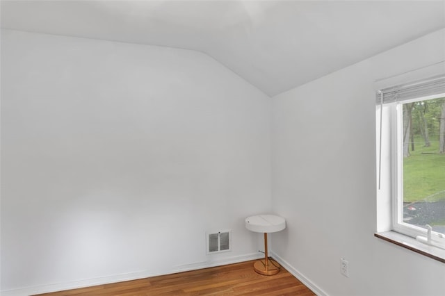 5352 Highgrove Rd, Whitehall, PA 15236 - empty room featuring vaulted ceiling, wood finished floors, and baseboards