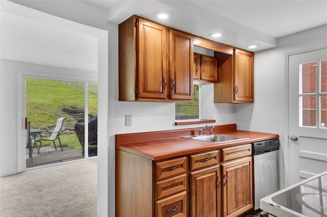 5352 Highgrove Rd, Whitehall, PA 15236 - kitchen with a sink, dishwasher, recessed lighting, carpet flooring, and brown cabinets
