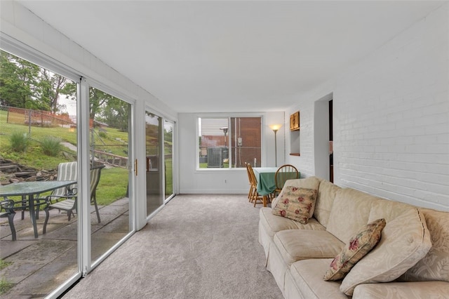 5352 Highgrove Rd, Whitehall, PA 15236 - sunroom featuring carpet and brick wall