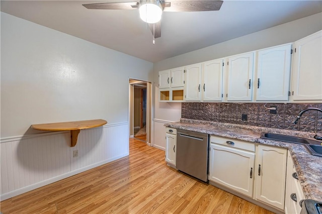 1248 Hyde Park Rd, Allegheny Twp Wml, PA 15656 - kitchen featuring dishwasher, a sink, tasteful backsplash, and white cabinetry